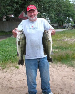 Sid Harris with two of h is five fish he caught on Lake Attitash 2010 tournament.  Both were over 5 lbs. each.