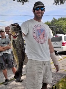 Jon Ducios with the lunker of the day a 4.41 lb largemouth at Waukewan 2014
